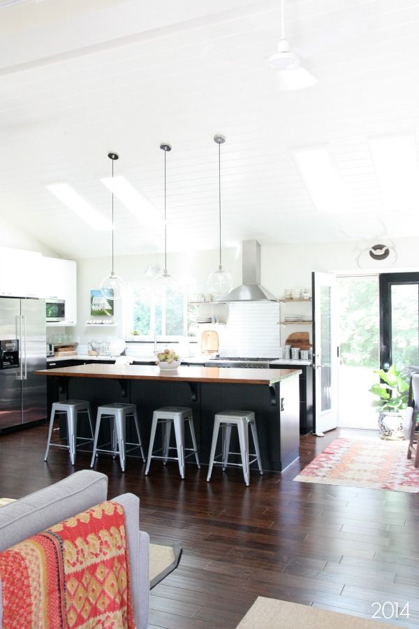 Black and white kitchen design with vaulted ceiling
